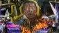 Mujeres queman una pancarta con el rostro del presidente filipino Rodrigo Duterte,  que tildan de misógino en Manila